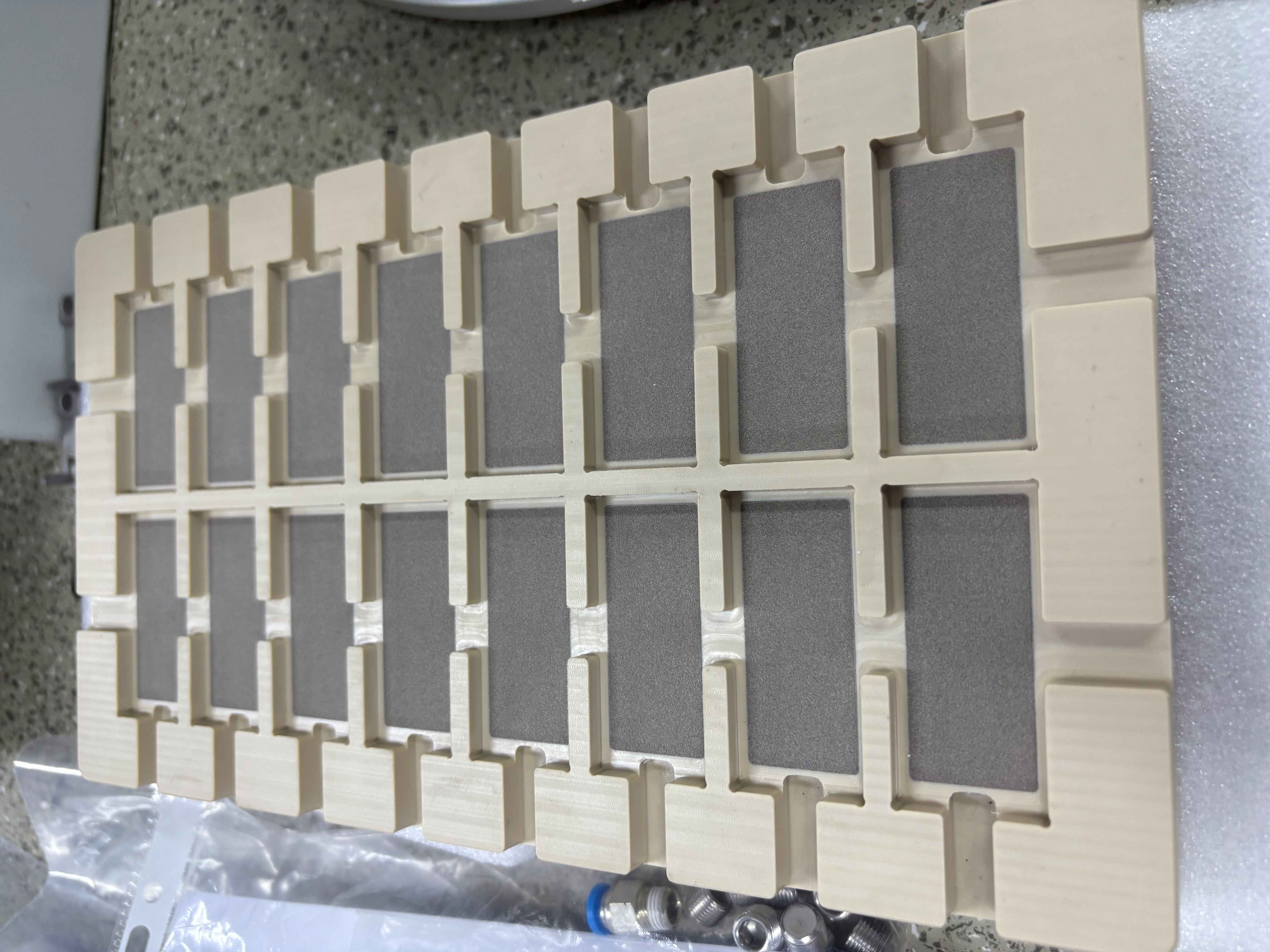 Porous ceramic vacuum chuck table with peek frame